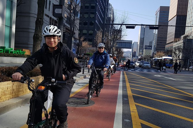 Market Food Tour & Evening E-bike Ride in Seoul - Bukchon hanok village: easier climbs, better photos, and a calmer feel