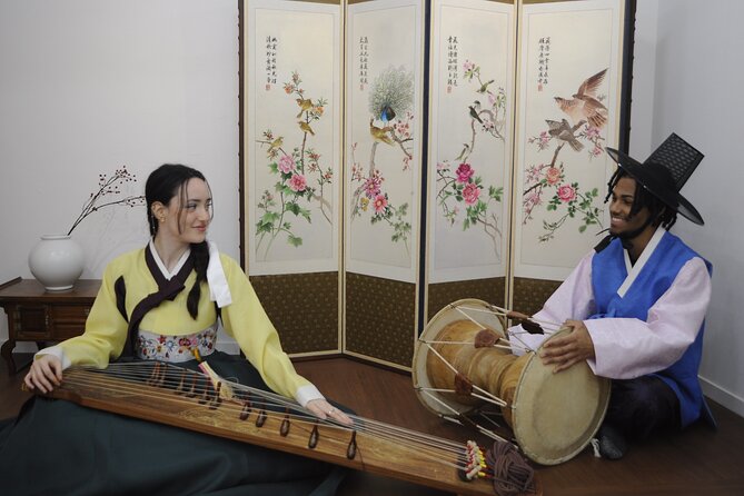 Play Gayageum in Hanbok Cultural Experience in Bukchon - Instruction style: English support with subtitle backup