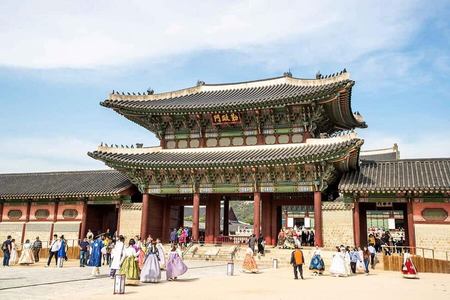 Seoul Day Tour: Gyeongbok Palace, Bukchon, Gwangjang Market - Bukchon Hanok Village: narrow lanes, preserved hanok houses, and secret-meeting photos
