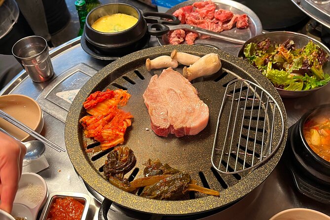 Seoul Korean BBQ Dinner Experience with Secret Food Tours - Ikseon-Dong Hanok Village Sets Up the BBQ Meal