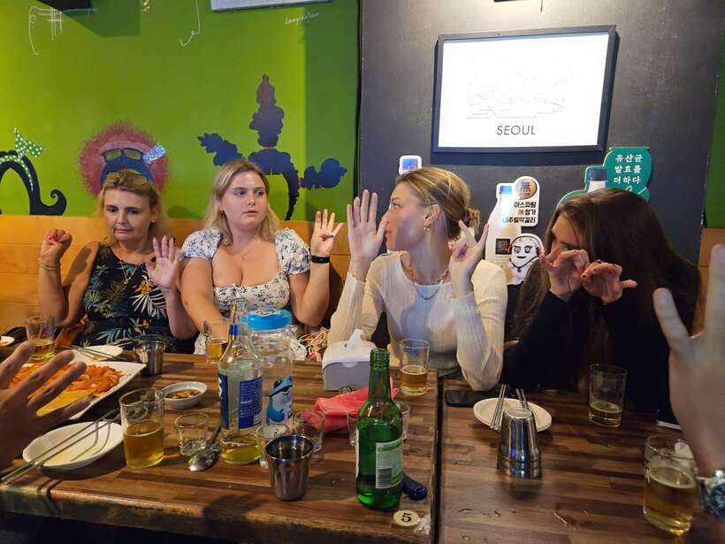Seoul: Korean Drinking Games Night (non-drinkers welcome) - Your drinks and food: Somaek, Soju Bomb, and kimchi seafood pancake