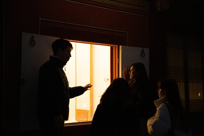 Seoul Night Palace & Market Food Tour with Vehicle - Changgyeonggung Palace after dark: night views plus an emotional story