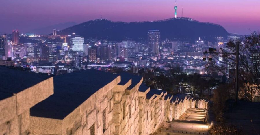 Seoul: Nighttime Tour of Palace, Market, Naksan Park & More - Changyeonggung Palace After Dark: Lighting, Stories, and Calm Grounds