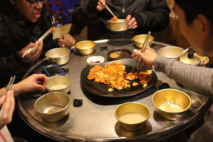 Small-Group Night Food Tour in Seoul with Korean BBQ - Korean BBQ dinner in Insadong: soju, rice wine, and real meat-time